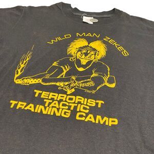 VTG Wild Man Zeke’s Terrorist Tactic Training Camp Tee Shirt 84’ USA Made Gun S